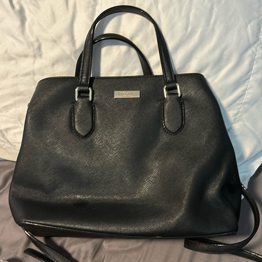 Kate spade black  purse. Without tags. Barely used.